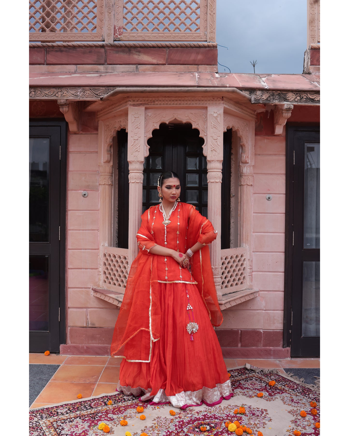 Orange Organza Kurti Paired with Chanderi Lehenga