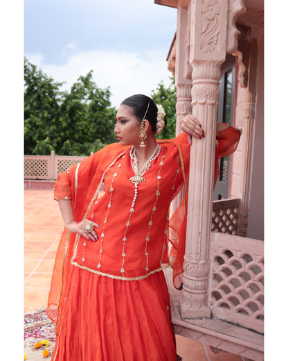 Orange Organza Kurti Paired with Chanderi Lehenga